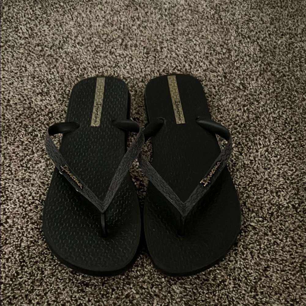 Ipanema Black Flip Flops with Gold Logo